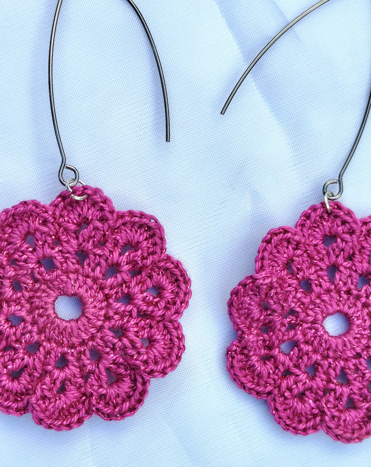Boucle d'oreille, Médaillon floral