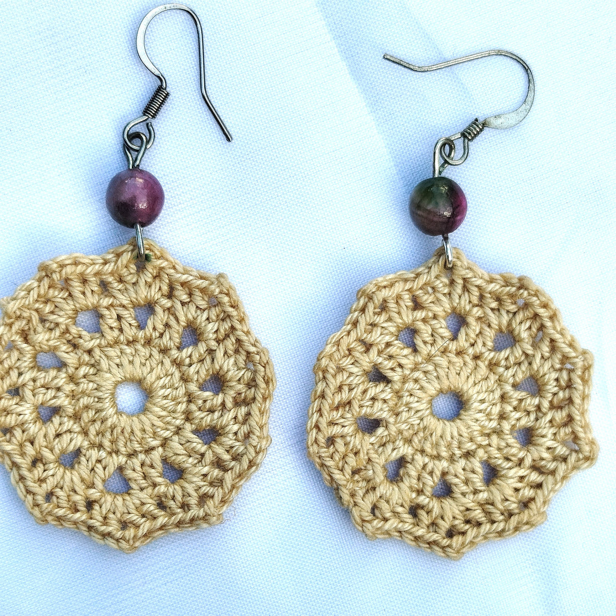 Boucle d'oreille, Médaillon