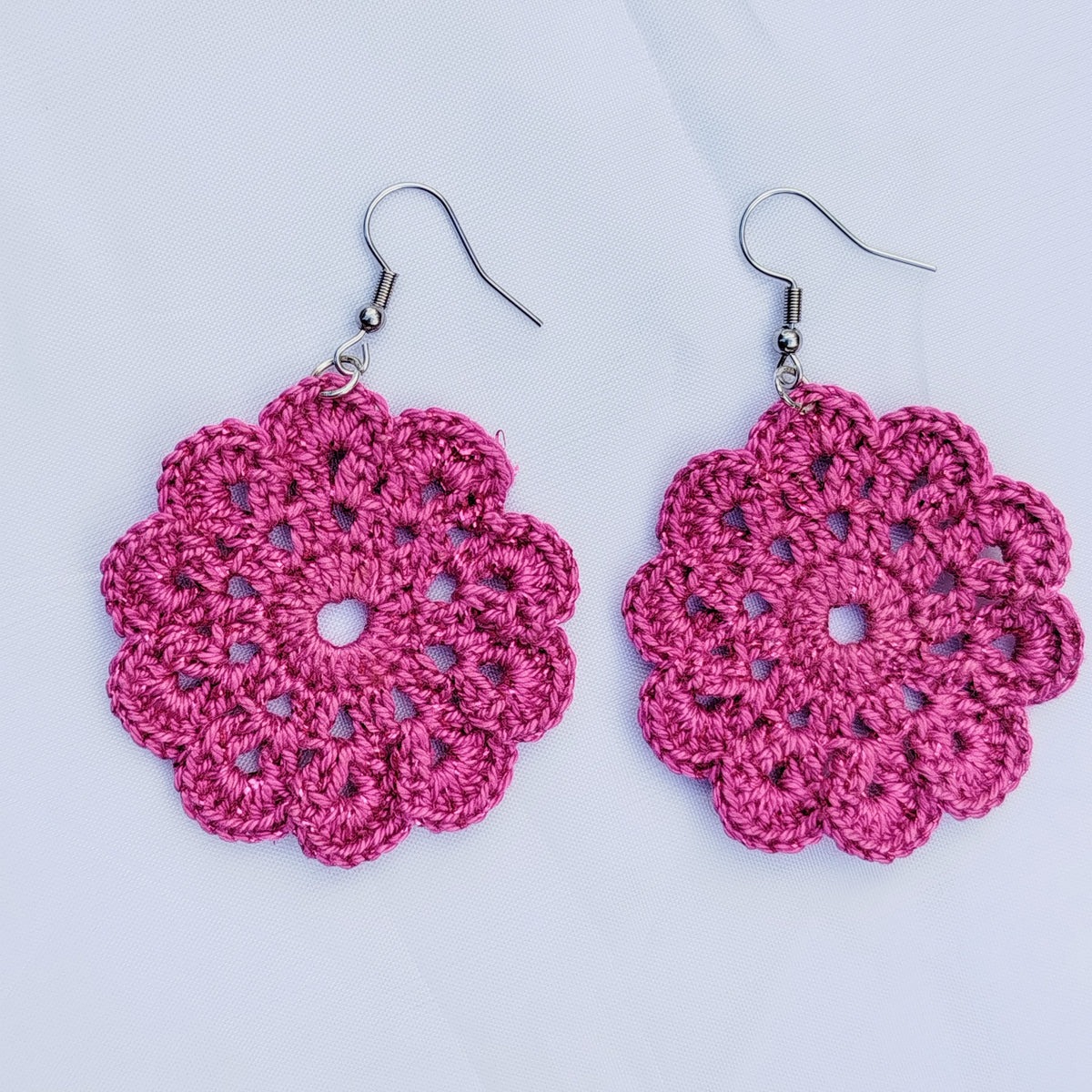 Boucle d'oreille, Médaillon floral