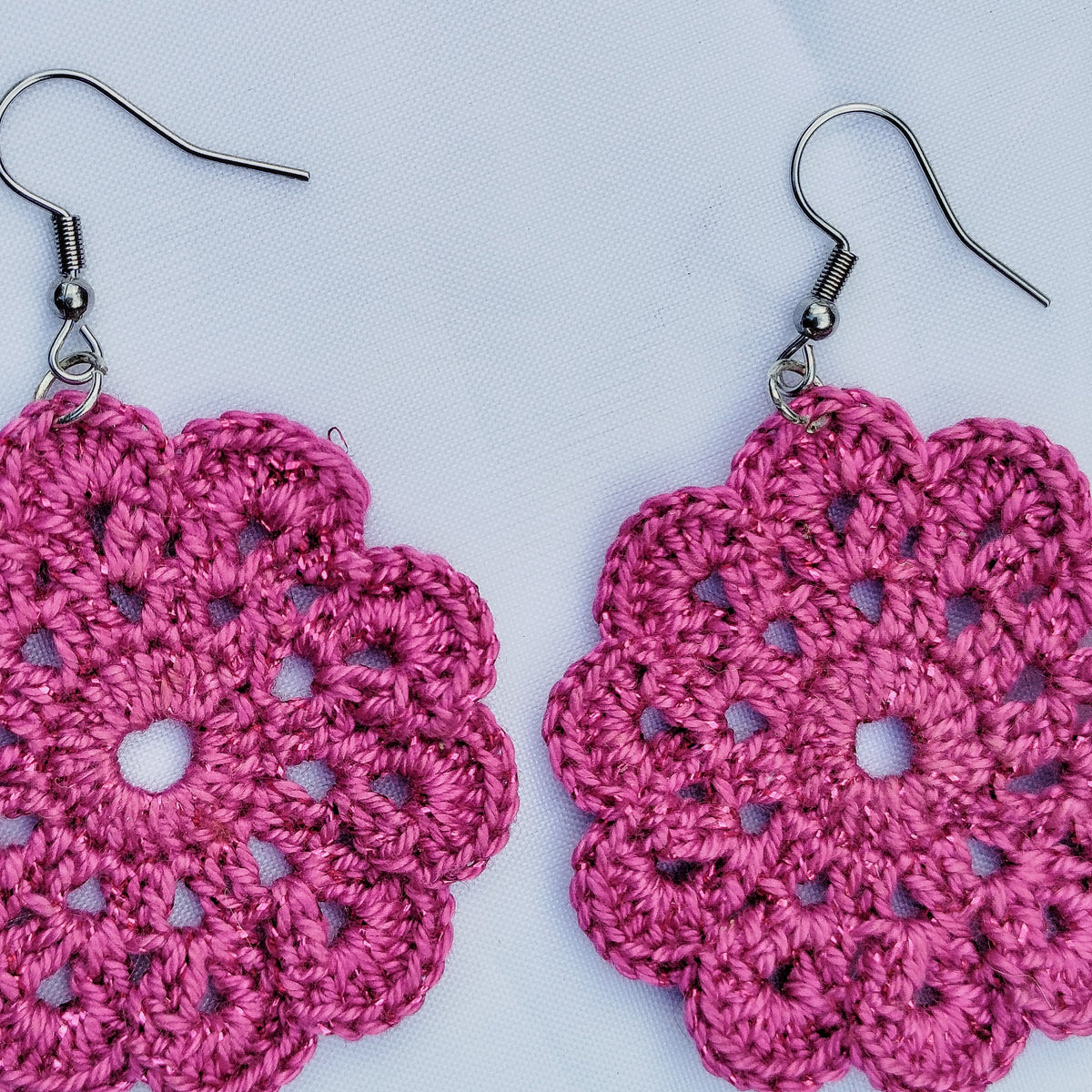 Boucle d'oreille, Médaillon floral