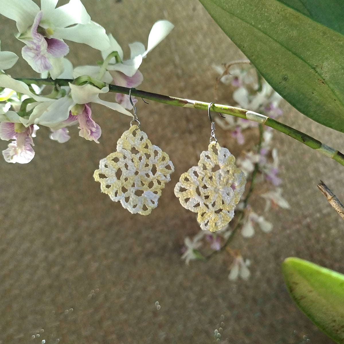 Boucle d'oreille, Carré ajouré