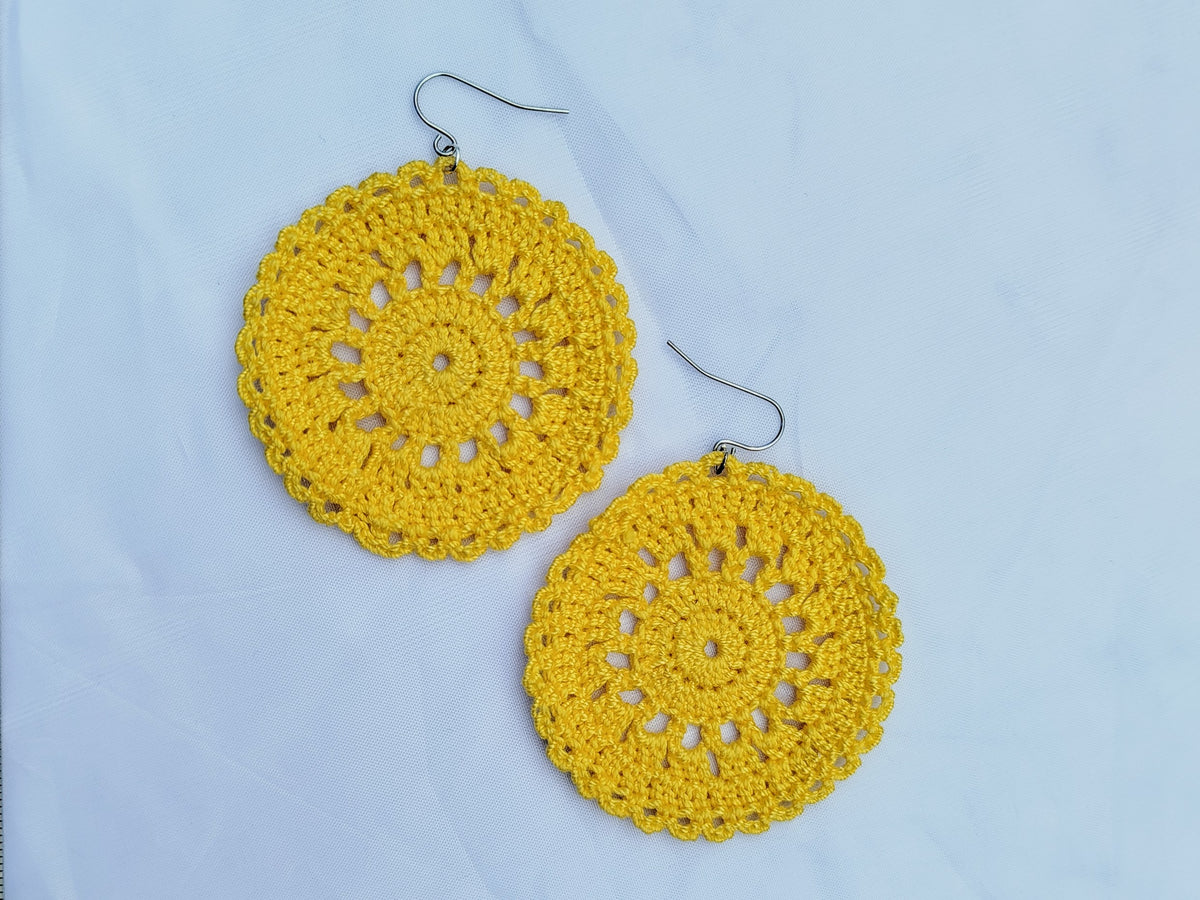 Boucle d'oreille, Grand médaillon