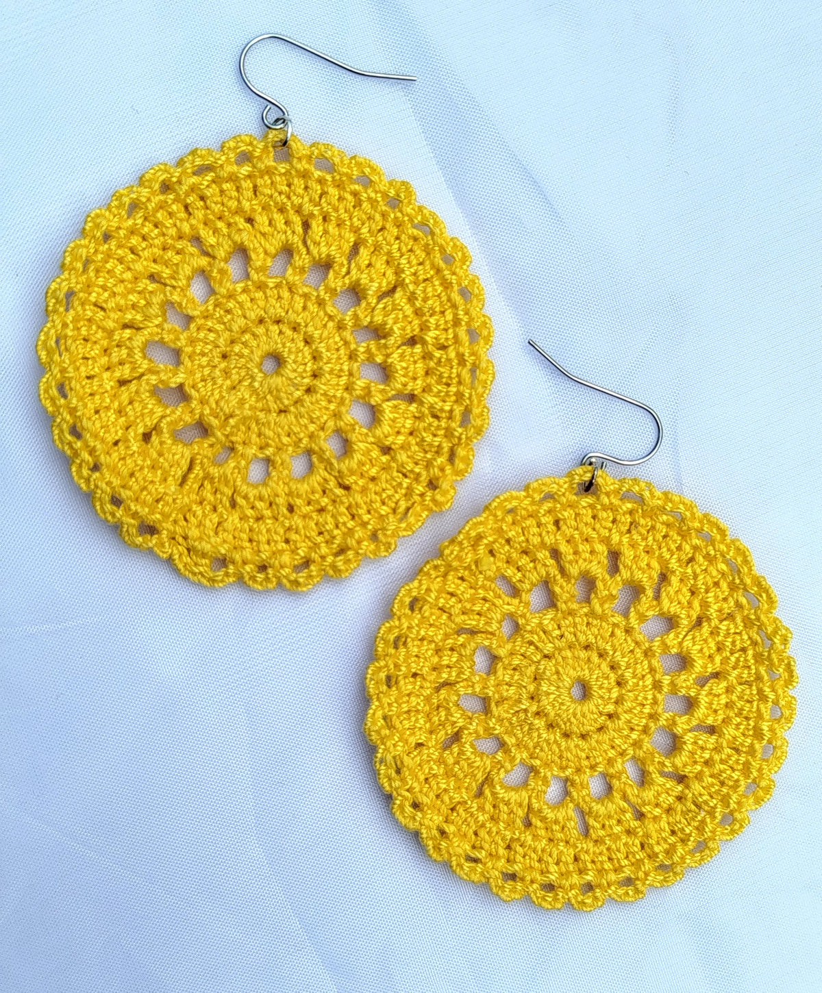 Boucle d'oreille, Grand médaillon