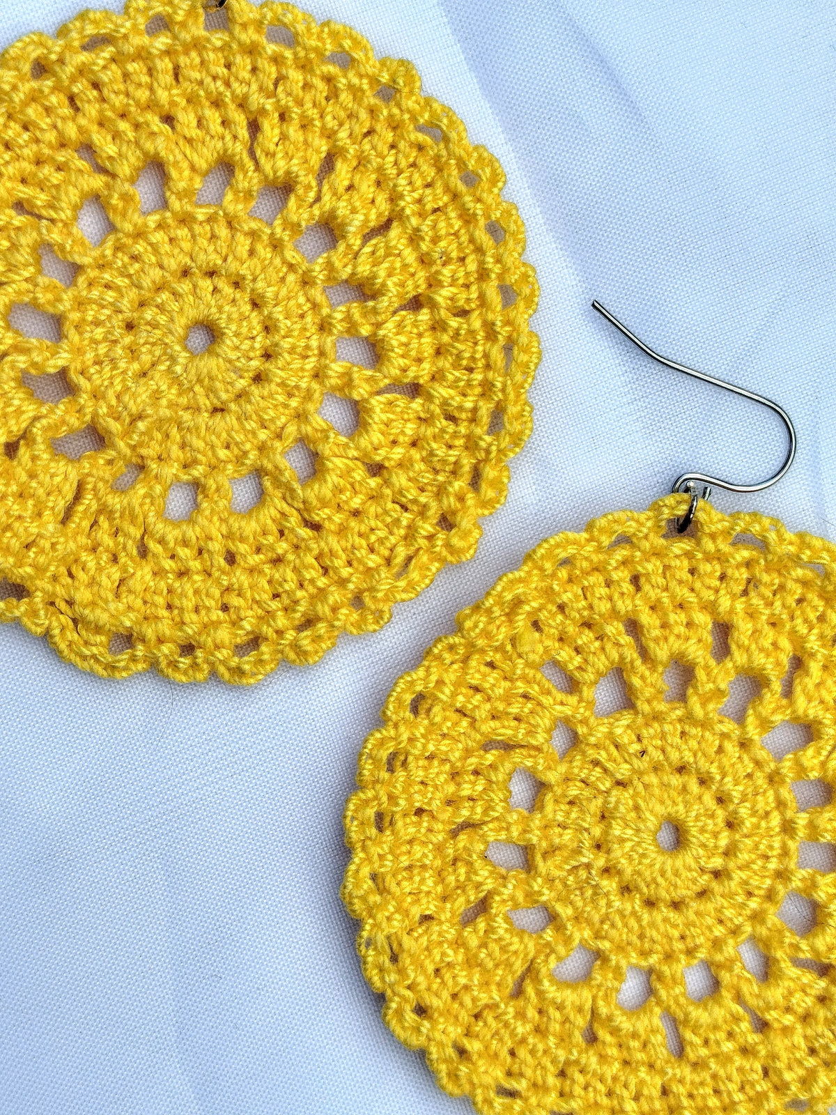 Boucle d'oreille, Grand médaillon