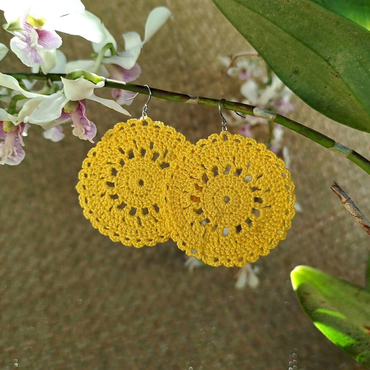 Boucle d'oreille, Grand médaillon