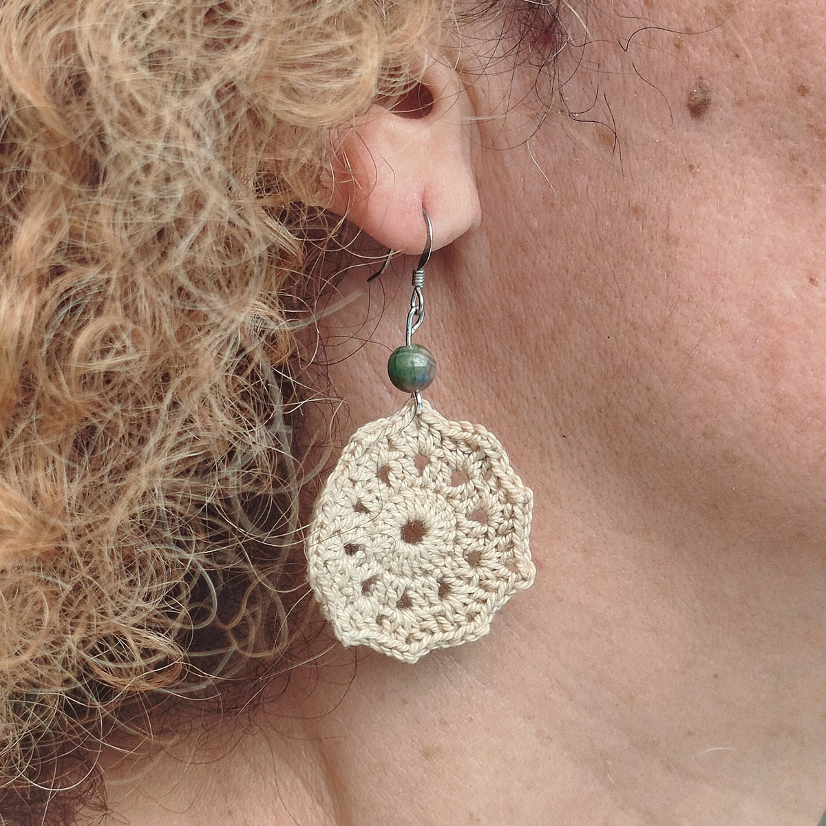 Boucle d'oreille, Médaillon