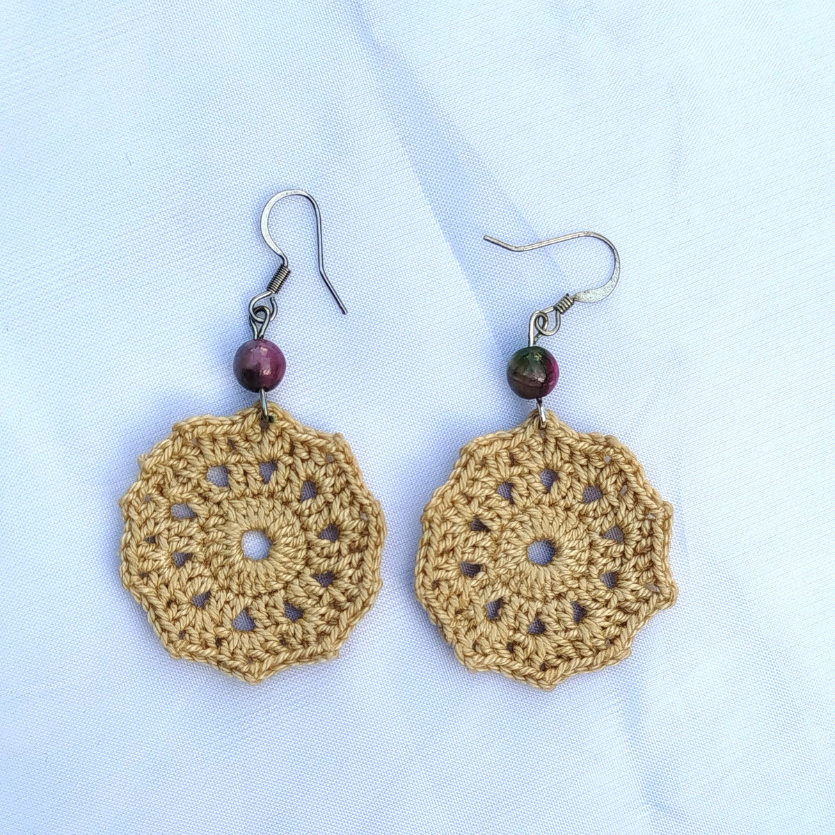 Boucle d'oreille, Médaillon